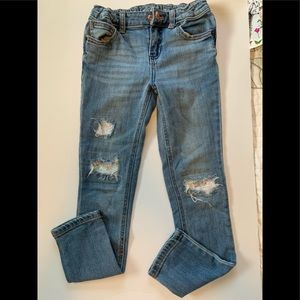 Sequined ripped jeans, adjustable waist.